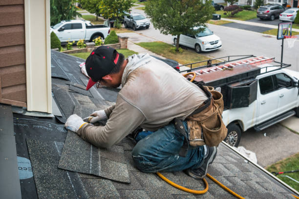 Professional Flat Roof Repair technician working in Pompano Beach, FL